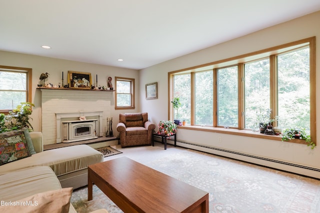 126 Christian Hill Rd, Great Barrington, MA 01230 - living room featuring a baseboard radiator, a fireplace with raised hearth, and recessed lighting
