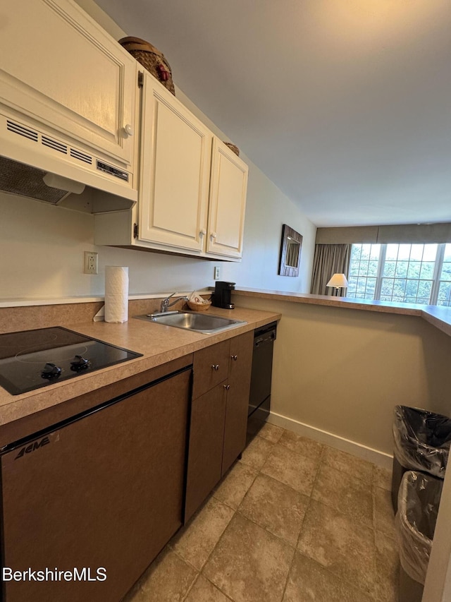 37 Corey Rd Unit 526, Hancock, MA 01237 - kitchen featuring black appliances, extractor fan, and white cabinets