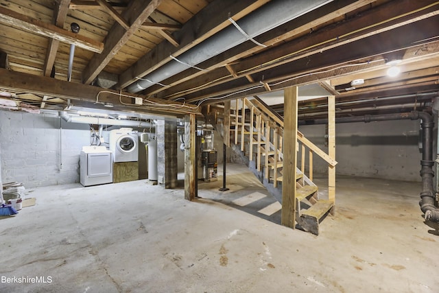 404 N St, Williamstown, MA 01267 - unfinished below grade area featuring washing machine and dryer, stairs, gas water heater, and heating unit