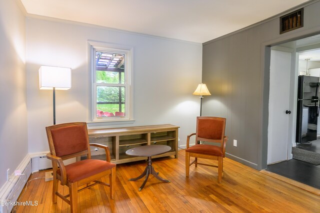 800 Simonds Rd, Williamstown, MA 01267 - living area with wood-type flooring and ornamental molding