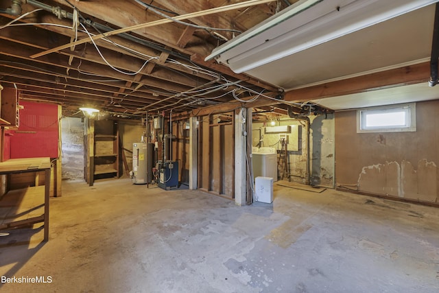 41 Pine St, Dalton, MA 01226 - basement featuring gas water heater, a heating unit, and washer / clothes dryer