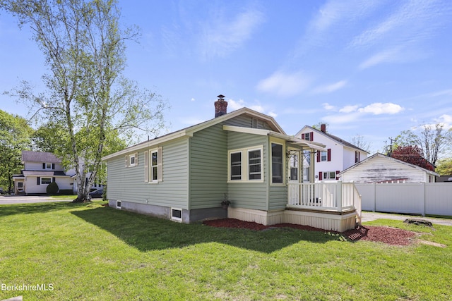 41 Pine St, Dalton, MA 01226 - back of house featuring a chimney and a sunroom