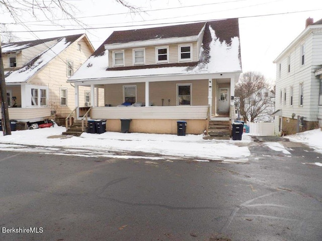 view of front of property featuring covered porch