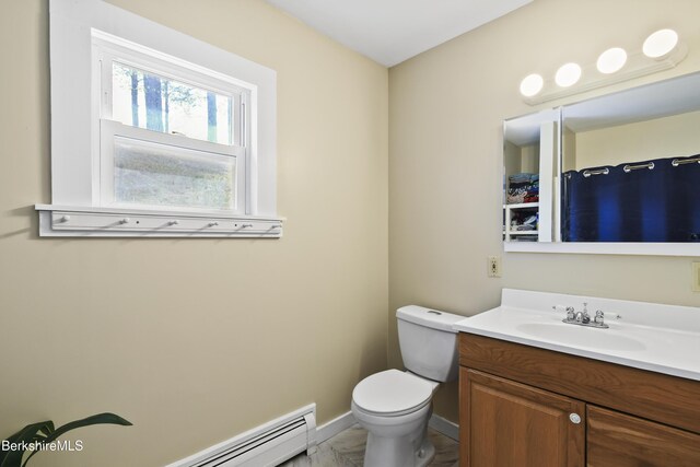 full bathroom featuring vanity, toilet, a baseboard radiator, and baseboards
