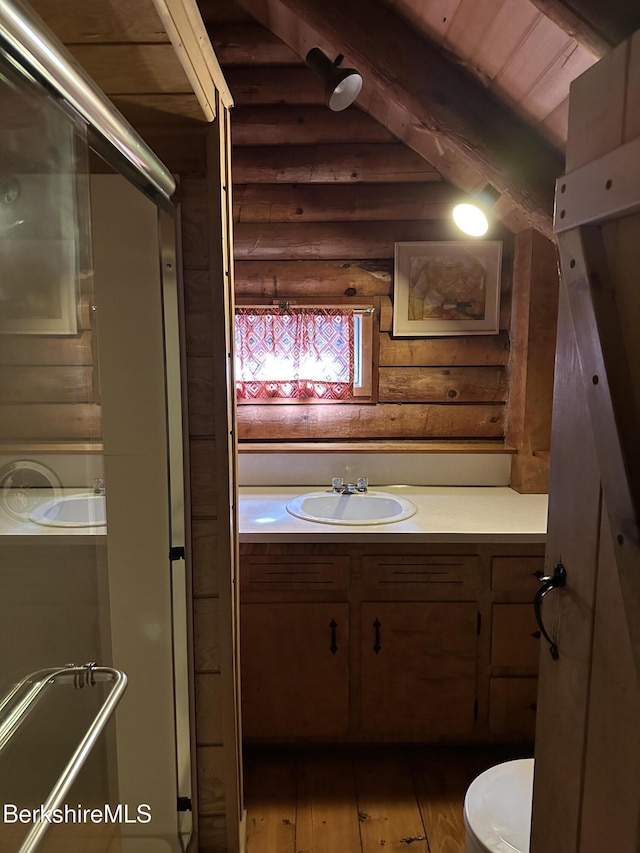 76 Corashire Rd, New Marlborough, MA 01230 - full bath with beamed ceiling, vanity, a shower stall, hardwood / wood-style flooring, and toilet