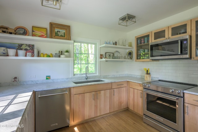 18 Creamery Rd, Egremont, MA 01258 - kitchen featuring stainless steel appliances, open shelves, light wood-style flooring, light countertops, and light brown cabinets
