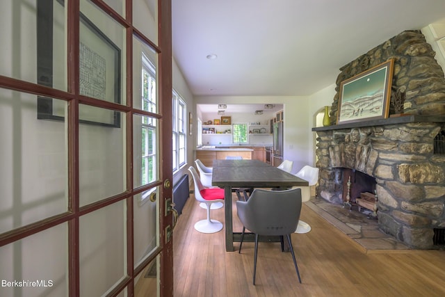 18 Creamery Rd, Egremont, MA 01258 - dining space featuring wood finished floors and a stone fireplace