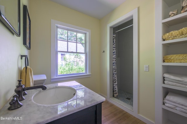 18 Creamery Rd, Egremont, MA 01258 - bathroom with vanity, tiled shower, wood finished floors, and built in features