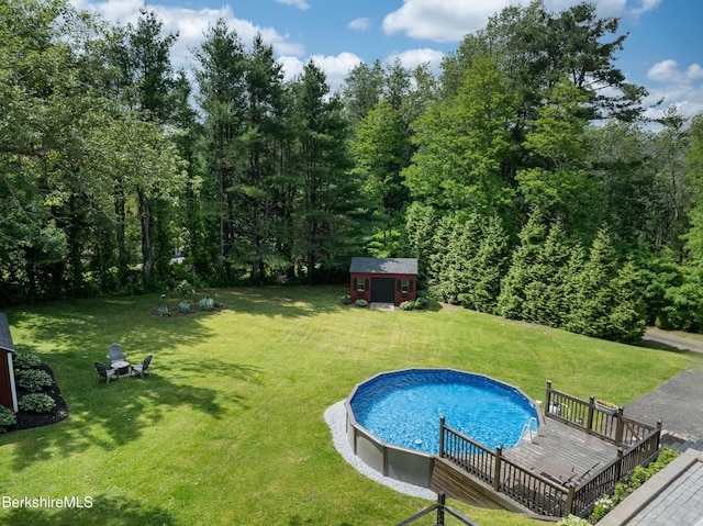 59 Orchard Rd, Dalton, MA 01226 - swimming pool featuring an outdoor structure, a deck, and a yard