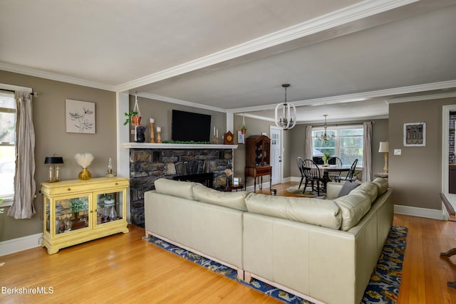 59 Orchard Rd, Dalton, MA 01226 - living area featuring a chandelier, ornamental molding, wood finished floors, and a fireplace