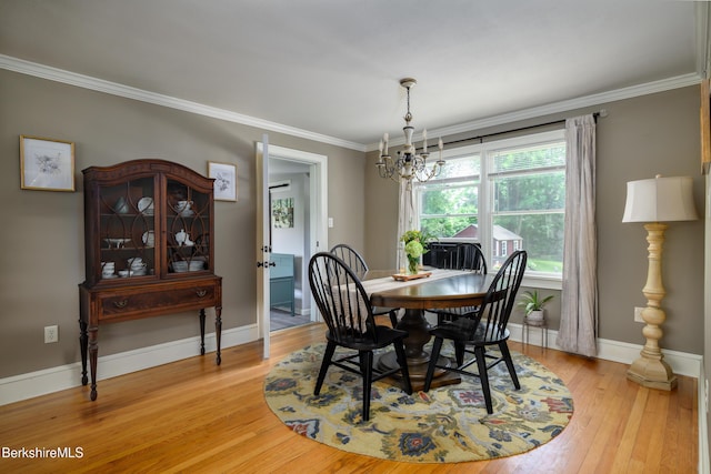 59 Orchard Rd, Dalton, MA 01226 - dining room with a chandelier, light wood-style floors, and ornamental molding