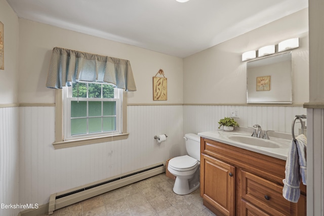 17 Jeffrey Dr, Pittsfield, MA 01201 - bathroom featuring a baseboard heating unit, a wainscoted wall, and vanity