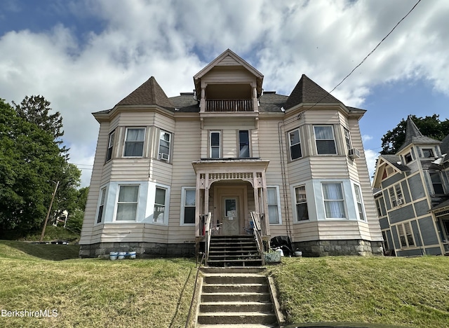 51 Bracewell Ave, North Adams, MA 01247 - victorian home with a front lawn and a balcony