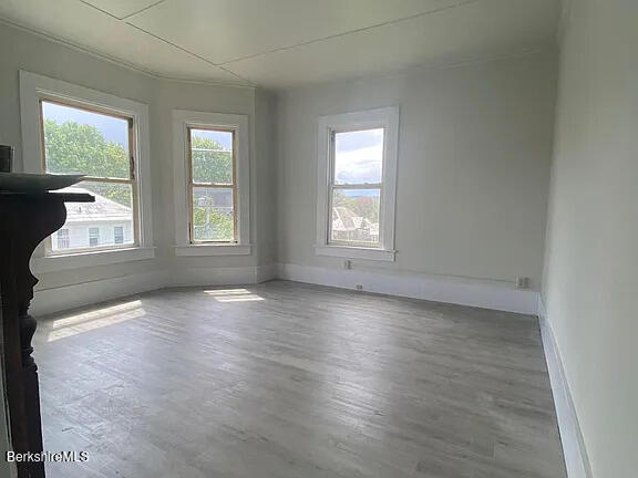 51 Bracewell Ave, North Adams, MA 01247 - spare room featuring wood finished floors and baseboards