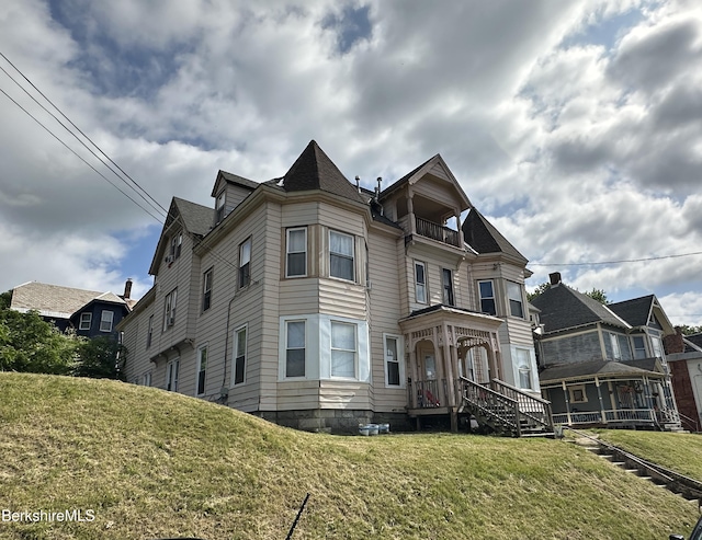 51 Bracewell Ave, North Adams, MA 01247 - view of front of property featuring a front yard and a balcony