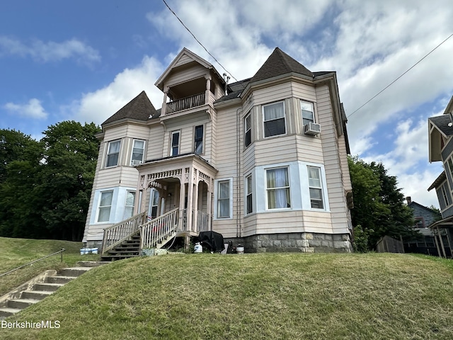 51 Bracewell Ave, North Adams, MA 01247 - victorian house with a balcony and a front yard