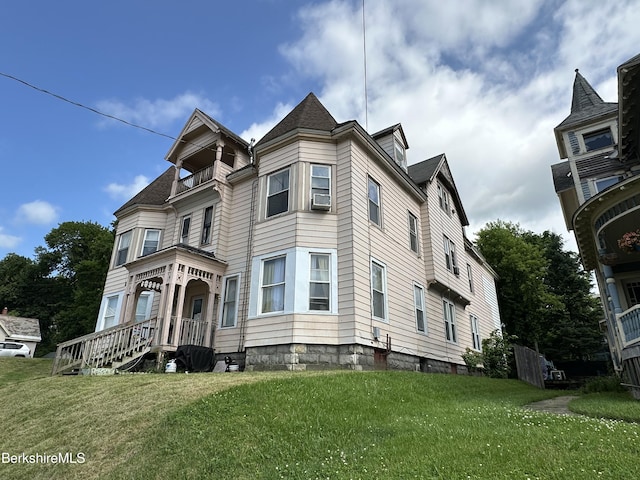 51 Bracewell Ave, North Adams, MA 01247 - view of front facade with a front yard