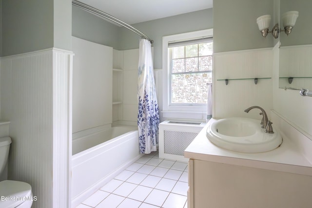 16 Revere Pkwy, Pittsfield, MA 01201 - full bath with radiator heating unit, shower / bath combo with shower curtain, vanity, tile patterned floors, and a wainscoted wall
