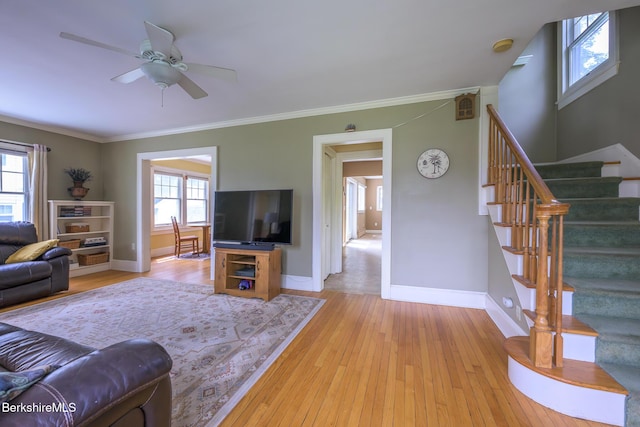 16 Revere Pkwy, Pittsfield, MA 01201 - living room featuring stairs, light wood-style floors, ceiling fan, and crown molding