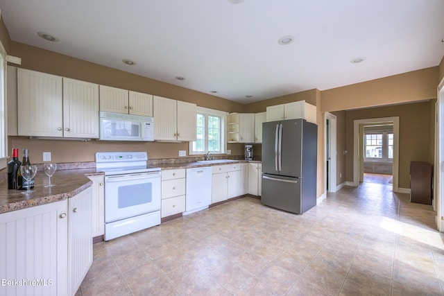 16 Revere Pkwy, Pittsfield, MA 01201 - kitchen featuring white appliances and white cabinets