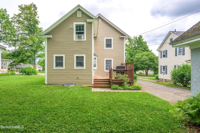 16 Revere Pkwy, Pittsfield, MA 01201 - rear view of property featuring driveway, a wooden deck, and a yard