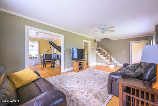 16 Revere Pkwy, Pittsfield, MA 01201 - living area featuring wood finished floors, stairway, ornamental molding, and ceiling fan