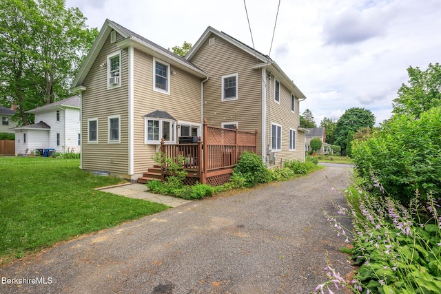 16 Revere Pkwy, Pittsfield, MA 01201 - back of house with a deck, a yard, and driveway