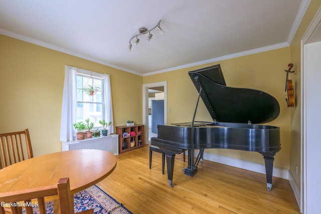 16 Revere Pkwy, Pittsfield, MA 01201 - living area with radiator heating unit, light wood-type flooring, and ornamental molding
