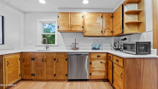76 New Lenox Rd, Lenox, MA 01240 - kitchen featuring stainless steel appliances, a sink, open shelves, light wood-style flooring, and light countertops