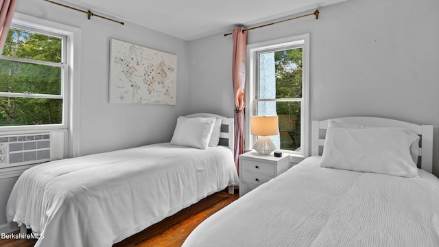 76 New Lenox Rd, Lenox, MA 01240 - bedroom featuring multiple windows, dark wood-style flooring, and cooling unit
