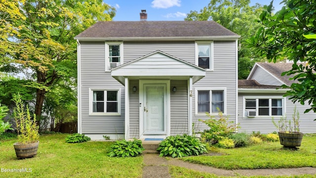 76 New Lenox Rd, Lenox, MA 01240 - view of front of home with a chimney, a front yard, and a shingled roof