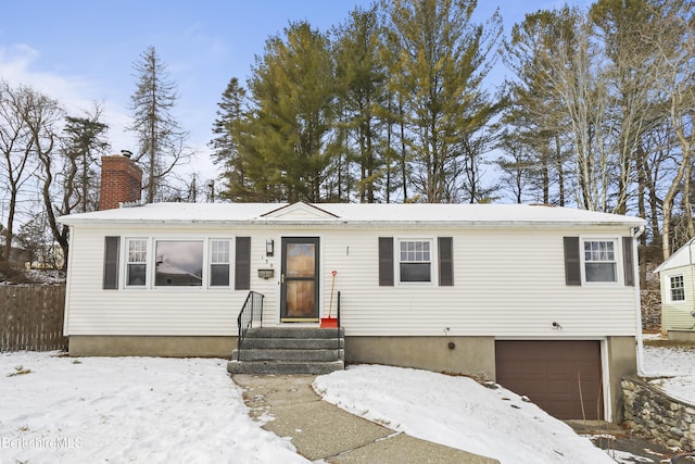 view of front of home with a garage