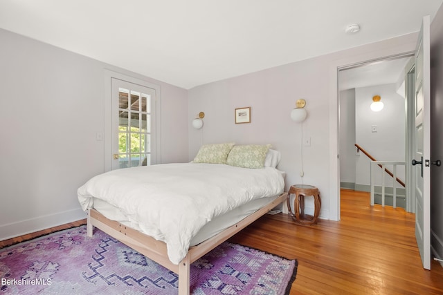 bedroom featuring wood-type flooring