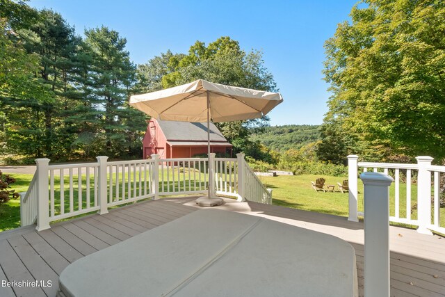 deck featuring a lawn