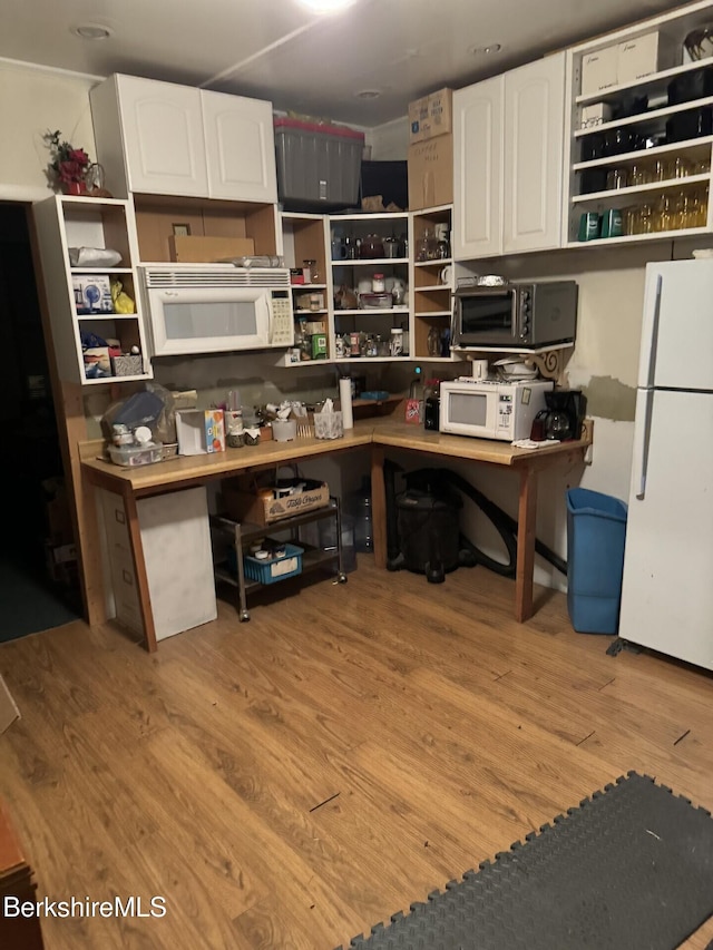 9 Anthony St, Adams, MA 01220 - kitchen featuring white appliances, open shelves, white cabinets, and light wood finished floors