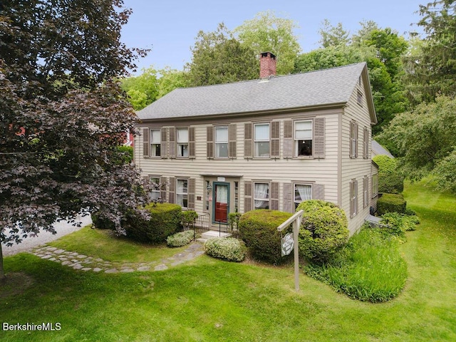 70 Main St, Egremont, MA 01258 - view of front of house featuring a chimney, a front lawn, and a shingled roof