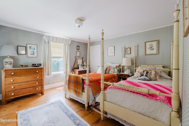 70 Main St, Egremont, MA 01258 - bedroom featuring wallpapered walls, ornamental molding, and wood-type flooring