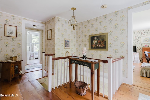 70 Main St, Egremont, MA 01258 - corridor featuring an upstairs landing, hardwood / wood-style floors, wallpapered walls, crown molding, and radiator heating unit