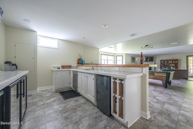 19 Aspen Way, Pittsfield, MA 01201 - kitchen with a sink, wine cooler, a peninsula, baseboards, and billiards table