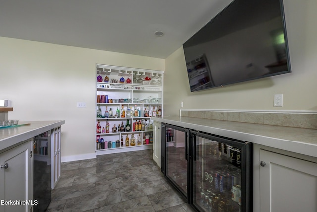 19 Aspen Way, Pittsfield, MA 01201 - indoor dry bar featuring beverage cooler, baseboards, and stone finish floors