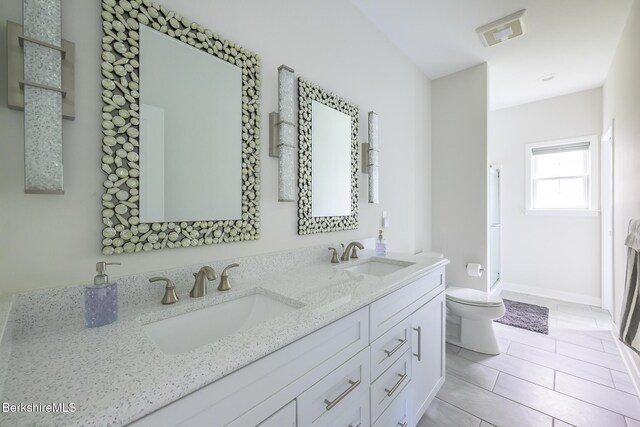19 Aspen Way, Pittsfield, MA 01201 - full bath with toilet, double vanity, a shower, and tile patterned flooring