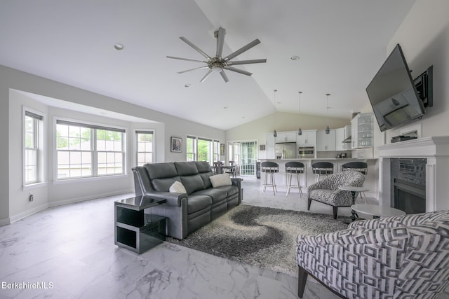19 Aspen Way, Pittsfield, MA 01201 - living room with lofted ceiling, ceiling fan, light marble finish flooring, and a fireplace