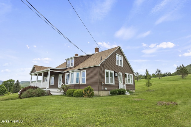 860 Stratton Rd, Williamstown, MA 01267 - view of front facade featuring covered porch, a chimney, a front lawn, and a shingled roof