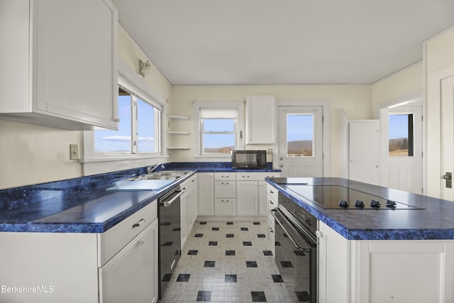 860 Stratton Rd, Williamstown, MA 01267 - kitchen with black appliances, dark countertops, a kitchen island, and a sink