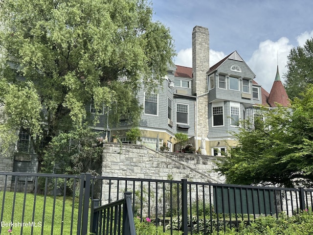 11 Prospect Hill Rd Unit 1, Stockbridge, MA 01262 - rear view of house with a chimney