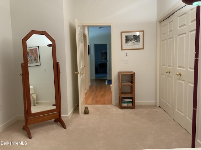 11 Prospect Hill Rd Unit 1, Stockbridge, MA 01262 - corridor featuring light colored carpet and arched walkways