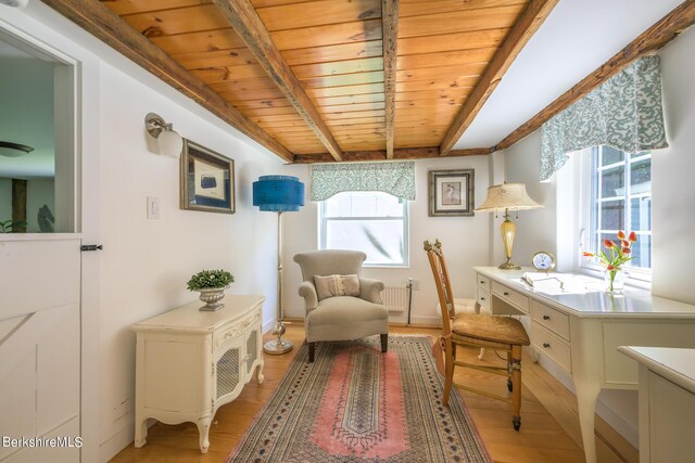 85 E Main St, Stockbridge, MA 01262 - sitting room with wooden ceiling with exposed beams, healthy amount of natural light, light wood-style floors, and radiator