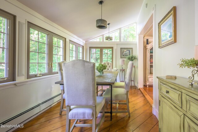 85 E Main St, Stockbridge, MA 01262 - dining room featuring a baseboard heating unit, light wood-style flooring, healthy amount of natural light, and lofted ceiling