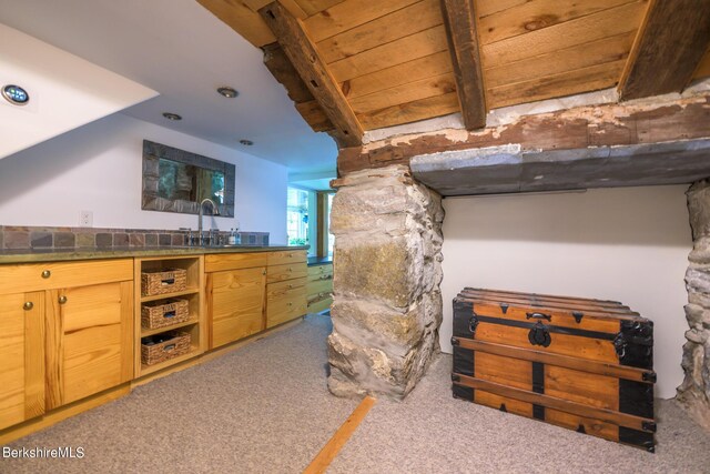 85 E Main St, Stockbridge, MA 01262 - carpeted bedroom with a sink and beamed ceiling