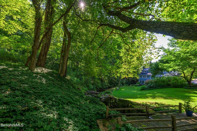 85 E Main St, Stockbridge, MA 01262 - view of grassy yard featuring a forest view